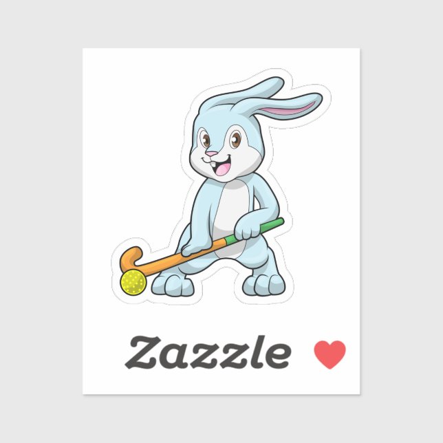 Adesivo Coelhinho no campo com bastão de hóquei (Folha)