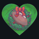 Adesivo Coração Futebol em Wreath de Natal em Verde<br><div class="desc">Futebol festivo em ornamentos, presentes e decorações divertidas de Holly Wreath apresenta nossa arte original de futebol, toda decolada para as férias dentro uma coroa verde holly com um arco vermelho brilhante contra um fundo verde texturizado. Esta bola divertida de esportes decorados em feriado é excelente para fãs de futebol...</div>