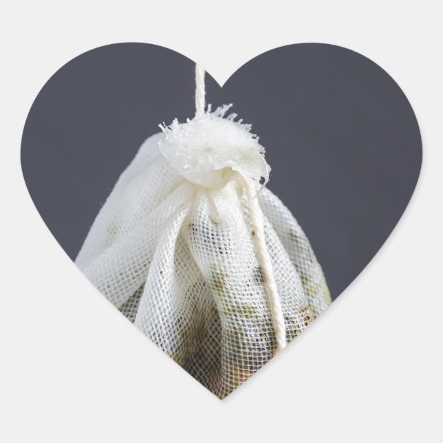 Adesivo Coração O saco de chá está pendurado em uma xícara (Frente)