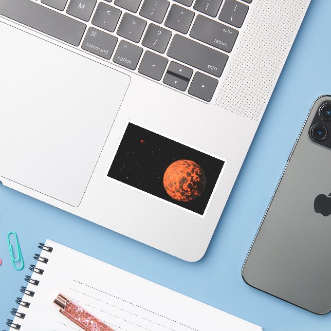 Adesivo Exoplaneta Ucf-1.01 Orbitando Uma Estrela Chamada  (Notebook com iPhone)
