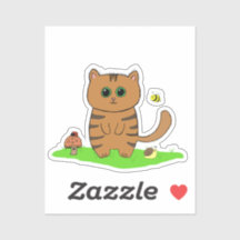 Gato de laranja-acastanhado em prado verde