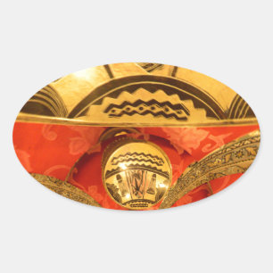 Adesivo Oval Arte Cultural Africana: Design Vermelho Ouro Rico