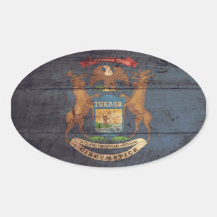 Adesivo Oval Bandeira de madeira velha de Michigan