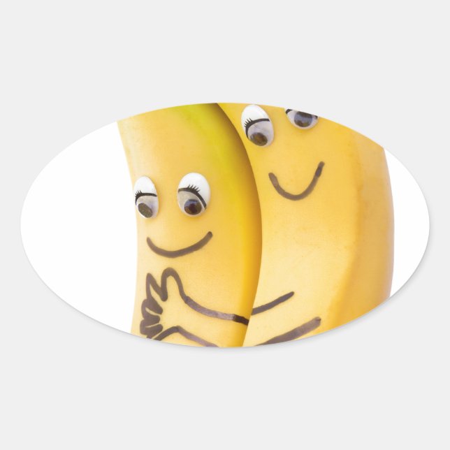 Adesivo Oval Duas bananas amantes com olhos e boca (Frente)
