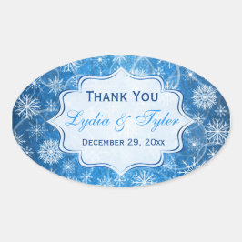 Adesivo Oval Flocos de neve brancos e azuis Vinheiros de Casame
