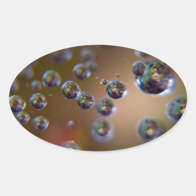 Adesivo Oval Gotas de água em movimento (Frente)