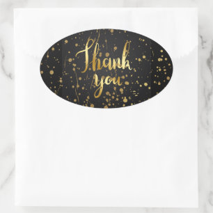 Adesivo Oval Obrigado, texto dourado em fundo preto,
