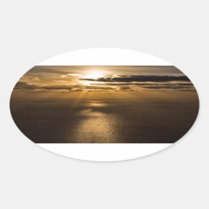 Adesivo Oval Sol acima do oceano Atlântico