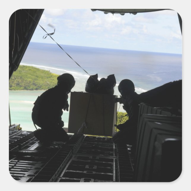 Adesivo Quadrado Aviões empurram uma palete de mercadorias doadas (Frente)