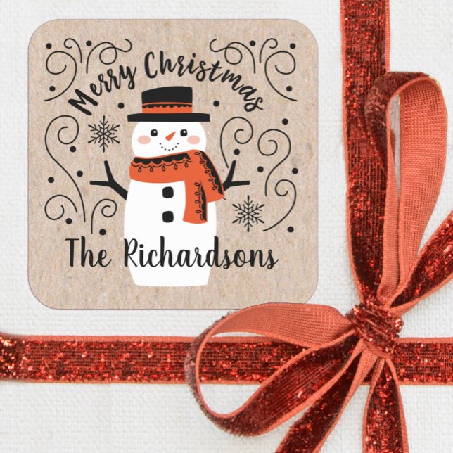 Adesivo Quadrado Bonito Natal Inverno Snowman (A festive kraft Christmas sticker with a cute snowman. Perfect for decorating your holiday gifts.)