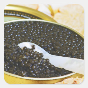 Adesivo Quadrado Caviar preto e uma colher de mãe de pérola para