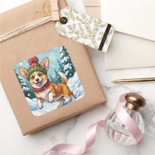 Adesivo Quadrado Corgi Alegre Saltando na Neve com Pom Pom