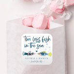 Adesivo Quadrado Dois Peixes A Menos Na Praça Do Casamento Do Mar<br><div class="desc">Este design apresenta um par náutico de peixes aquosos e um tipo de letra moderna. Clique no botão "Personalizar ainda mais" para começar com seu layout - até mesmo mudar a cor do texto! Veja a coleção inteira para mais itens correspondentes!</div>
