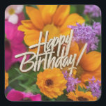 Adesivo Quadrado Feliz Aniversário Vibrante Flores Coloridas da pri<br><div class="desc">Feliz aniversário personaliza o nome das flores de primavera,  azul,  vermelha,  amarela,  verde e violeta.</div>