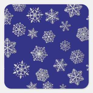 Adesivo Quadrado Flocos de neve prateados em um fundo azul escuro