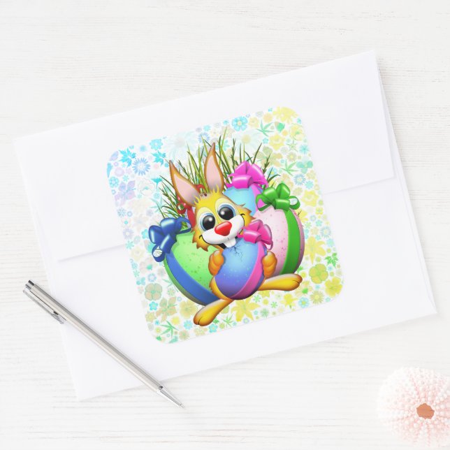Adesivo Quadrado Funny Bunny biting an Easter Egg (Envelope)