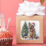 Adesivo Quadrado German shepherd por Snowy Christmas Tree<br><div class="desc">Celebrar os feriados com este adesivo detalhado com um German shepherd vestindo um chapéu de Papai Noel, sentado ao lado de uma árvore de Natal coberta de neve enfeitada com ornamentos coloridos. Flocos de neve espalhados, pinecones e luzes de fadas brilhantes aumentam a atmosfera festiva de inverno. Esta design limpa...</div>