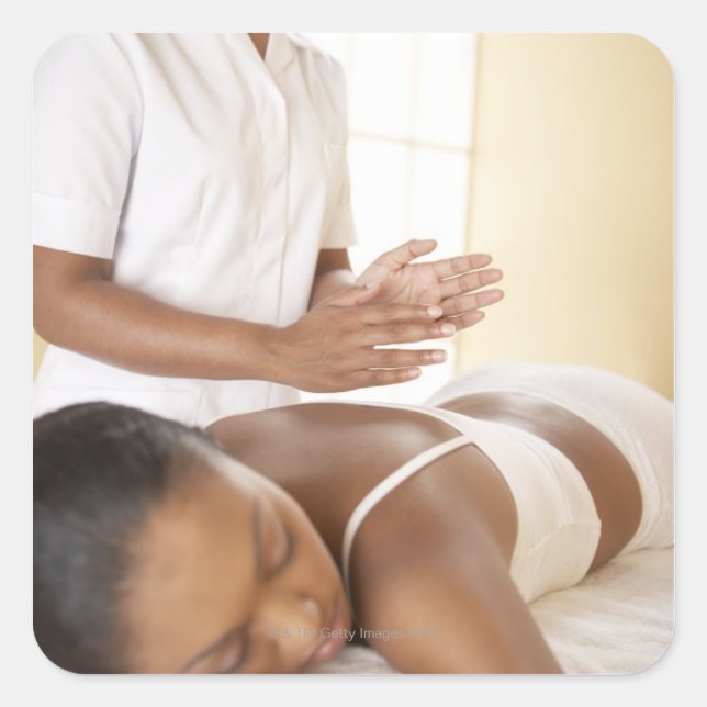 Adesivo Quadrado Massagem nas costas. Mulher que recebe massagem na (Frente)