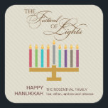 Adesivo Quadrado Menorah colorido Hanukkah<br><div class="desc">Está aqui um gráfico do divertimento procura uma etiqueta de Hanukkah. Um menorah colorido destaca taupe listrado um painel colorido com um "festival de luzes ornamentado" em um tratamento tipográfico acima. Uma mensagem personalizada do special vai embaixo. Excelente como selos do envelope ou para colar em pacotes ou em presentes...</div>