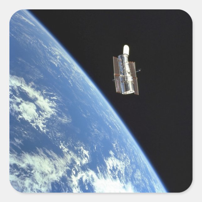 Adesivo Quadrado O telescópio espacial Hubble com uma terra azul (Frente)