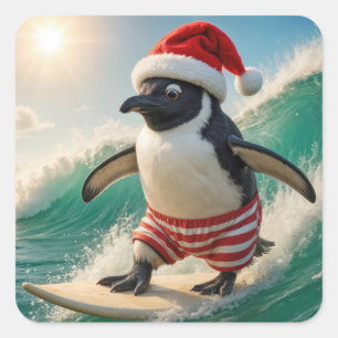 Adesivo Quadrado Pinguim de Natal Surfando em uma Onda do Oceano