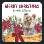 Adesivo Quadrado Poinsettia Yorkshire Terrier Christmas Basket<br><div class="desc">Esta bonito correspondência ou presente adesivo Holiday tem uma imagem de uma cesta de flores vermelhas de poinsettia, flores brancas, bagas vermelhas e pererecas para pinheiros. No meio está um adorável cão Terrier Yorkshire. No topo está o texto vermelho que diz MERRY CHRISTMAS, com sua assinatura em um roteiro verde...</div>
