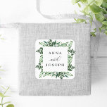 Adesivo Quadrado Quadro de Estufa | Casamento Botânico Por Aquarela<br><div class="desc">Coloque o seu convite em envelopes ou favores com estes elegantes adesivos botânicos de inverno que apresentam os seus nomes enquadrados por uma borda quadrada de cor d'água exuberante em tons de verde,  num fundo branco nítido. Coordena-se com a nossa coleção de casamentos de Estufa.</div>