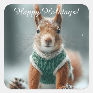 Adesivo Quadrado Red Squirrel in a Green Knitted Sweater with Text
