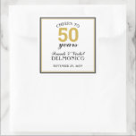 Adesivo Quadrado Saúde a 50 anos de aniversário de casamento Dourad<br><div class="desc">Celebre seu 50º aniversário de casamento com este Vossa Excelência a 50 anos de colega de aniversário de casamento. Este design apresenta borda preta e dourada com o texto que diz "CHEERS TO 50 anos." Personalize este item com o seu primeiro e sobrenomes e a data do evento. Faz uma...</div>