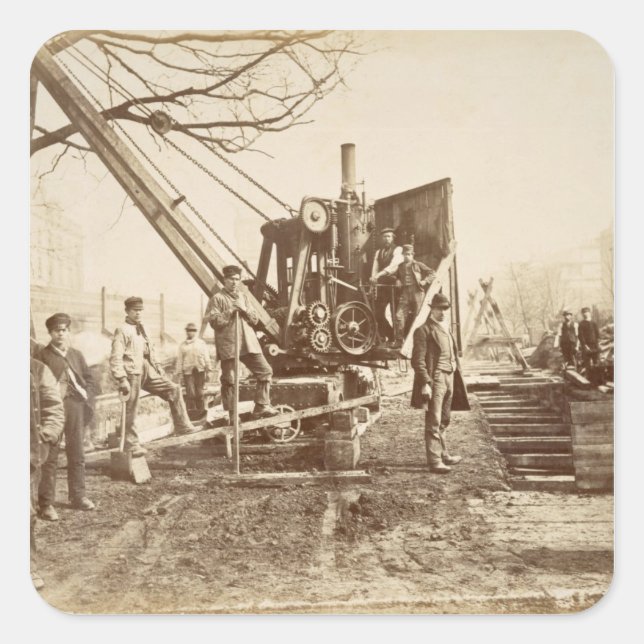 Adesivo Quadrado Uma grua a vapor em funcionamento durante a constr (Frente)