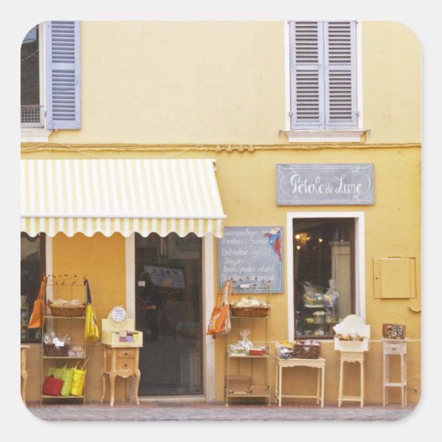 Adesivo Quadrado Uma rua de mercado na velha cidade com um compro (Frente)