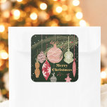 Adesivo Quadrado Vintage Ornaments Merry Christmas Illustrations<br><div class="desc">Adicione um toque festivo aos seus presentes de Natal ou decorações com este adesivo de Natal inspirado na safra. Apresentando ilustrações clássicas de Enfeites de natal penduradas em uma ramificação de pínus, esta design traz um encanto nostálgico com suas cores quentes e sensação retrô. Perfeito para selar cartões de natal,...</div>