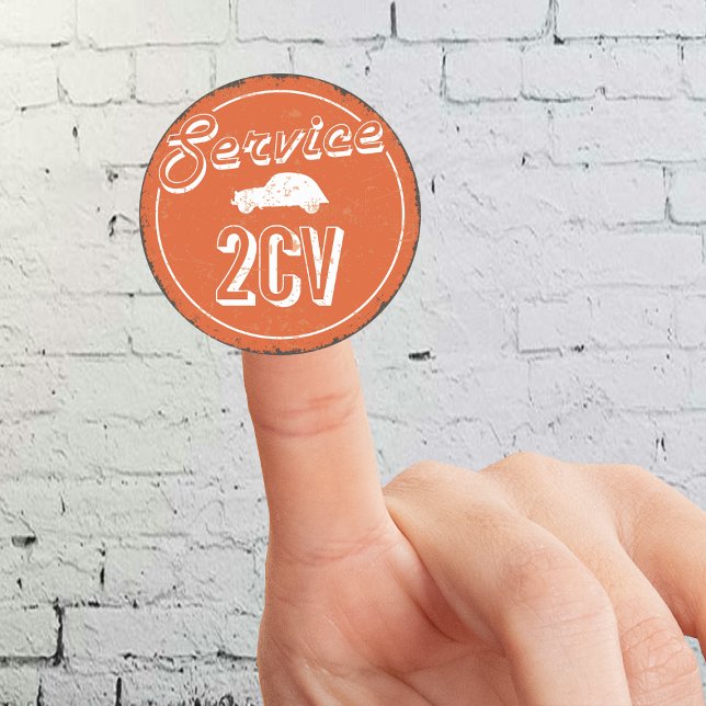 Adesivo Redondo 2CV Service Vintage (2CV Round Sticker in Orange with a White Vintage Text and Deux Chevaux Illustration)