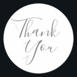 Adesivo Redondo Assinatura Elegante Casamento Obrigado Por<br><div class="desc">Projetado para coordenar com a nossa coleção de casamento Signature,  com um belo obrigado branco de script que você envia em letras brancas chic. Perfeito para selos de envelopes e adesivos. Projetado por Thisnotme©</div>