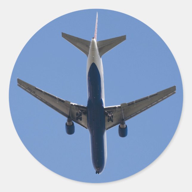 Adesivo Redondo Avião solteiro sobre o fundo do céu azul (Frente)