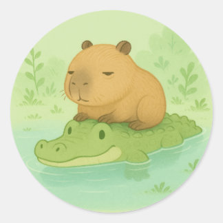 Adesivo Redondo Banda desenhada Capybara sobre Crocodilo Verde