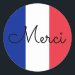 Adesivo Redondo Bandeira da França Colors Merci<br><div class="desc">Merci... um obrigado francês que você envia contra as cores da bandeira francesa. Você pode mudar o estilo de caligrafia monolina moderna para criar sua própria mensagem de texto personalizada. Tente um estilo de fonte, tamanho e cor diferentes e personalize o design de texto para fazer seus próprios adesivos de...</div>