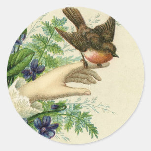 Adesivo Redondo Beautiful hand with a bird and flowers