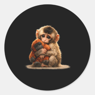 Adesivo Redondo Bebê macaco abraçando bichinho de pelúcia fofo mac
