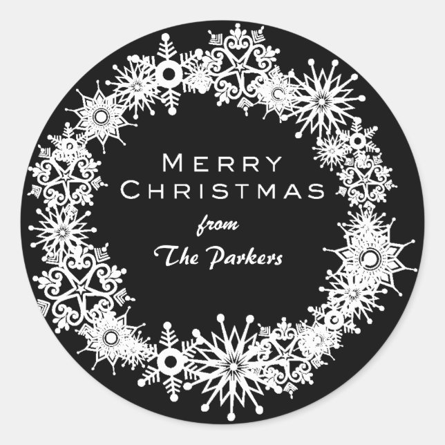 Adesivo Redondo Belas flocos de neve sobre fundo preto (Frente)