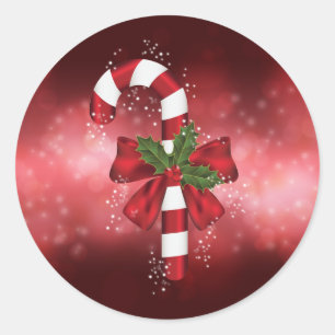 Adesivo Redondo Bengala de Natal Vermelha em um Fundo Vermelho Bok