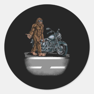 Adesivo Redondo Bigfoot Andando Em Uma Bicicleta De Moto Tentando