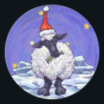 Adesivo Redondo Boi Natal<br><div class="desc">Parada Animal Festivo Presentes e Acessórios de Natal em Ovelha apresenta nossa divertida trabalho de arte de uma linda ovelha branca e preta, apunhalada em um chapéu de Papai Noel, em uma paisagem nevada, contra um céu azul escuro e estrelado, texturizado digitalmente, pintado pelo ilustrador de livros infantis Traci Van...</div>
