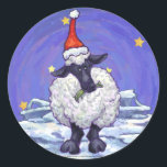 Adesivo Redondo Boi Natal<br><div class="desc">Parada Animal Festivo Presentes e Acessórios de Natal em Ovelha apresenta nossa divertida trabalho de arte de uma linda ovelha branca e preta, apunhalada em um chapéu de Papai Noel, em uma paisagem nevada, contra um céu azul escuro e estrelado, texturizado digitalmente, pintado pelo ilustrador de livros infantis Traci Van...</div>