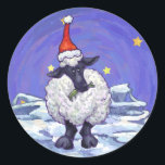 Adesivo Redondo Boi Natal<br><div class="desc">Parada Animal Festivo Presentes e Acessórios de Natal em Ovelha apresenta nossa divertida trabalho de arte de uma linda ovelha branca e preta, apunhalada em um chapéu de Papai Noel, em uma paisagem nevada, contra um céu azul escuro e estrelado, texturizado digitalmente, pintado pelo ilustrador de livros infantis Traci Van...</div>