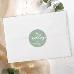 Adesivo Redondo Caligrafia Moderna O Casamento De Sage Green<br><div class="desc">Prepare-se para ser hipnotizado pela nossa fantástica suíte de casamento verde! Apresentando uma delicada ilustração das folhas de eucalipto aliadas a uma caligrafia ousada e elegante, é a combinação perfeita para o seu casamento encantador de hortas. Se você está perdendo algum item ou tem um pedido especial, não hesite em...</div>