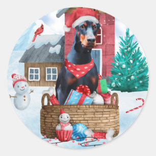 Adesivo Redondo Cão Doberman na Casa de Natal na Neve