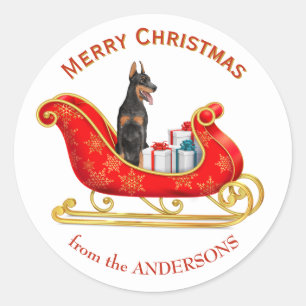 Adesivo Redondo Cão Doberman Pinscher de trenó de Natal