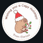 Adesivo Redondo Capybara Christmas Stickers Engraçado<br><div class="desc">Bonita capybara com chapéu santa,  perfeita para ir com os presentes de Natal.</div>