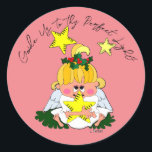 Adesivo Redondo Cartoon Christmas Angel Holding Star Sticker<br><div class="desc">Este lindo anjo de desenho animado agarrou uma estrela e está aguentando firme! A mensagem de "guie-nos a eles a luz perfeita!" pode ser removida ou modificada para uma mensagem personalizada. O fundo do rosa pode ser alterado. O desenho original de Linda Becker. Adicione este anjo às suas cartas de...</div>